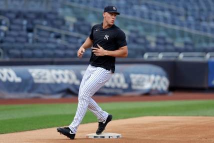Jul 21, 2023; Bronx, New York, USA; New York Yankees injured outfielder Aaron Judge (99) works out before a game against the Kansas City Royals at Yankee Stadium. Mandatory Credit: Brad Penner-USA TODAY Sports