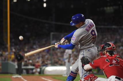 Jul 21, 2023; Boston, Massachusetts, USA;  New York Mets center fielder Brandon Nimmo (9) hits a two-run home run during the third inning against the Boston Red Sox at Fenway Park. Mandatory Credit: Bob DeChiara-USA TODAY Sports