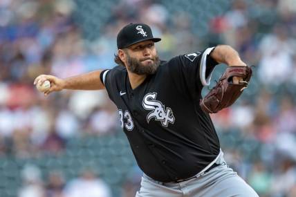 Jul 21, 2023; Minneapolis, Minnesota, USA; Chicago White Sox starting pitcher Lance Lynn (33) delivers a pitch against the Minnesota Twins in the first inning at Target Field. Mandatory Credit: Jesse Johnson-USA TODAY Sports