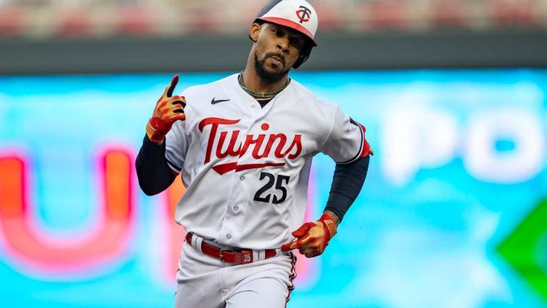 Jul 21, 2023; Minneapolis, Minnesota, USA; Minnesota Twins designated hitter Byron Buxton (25) celebrates hitting a solo home run against the Chicago White Sox in the fourth inning at Target Field. Mandatory Credit: Jesse Johnson-USA TODAY Sports