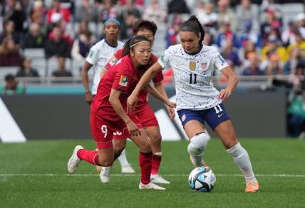 Jul 22, 2023; Auckland, NZL; USA forward Sophia Smith (11) gets the ball past Vietnam forward Huynh Nhu (9) in the second half of a group stage match in the 2023 FIFA Women's World Cup at Eden Park. Mandatory Credit: Jenna Watson-USA TODAY Sports
