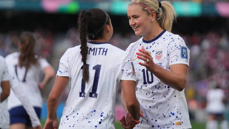 Jul 22, 2023; Auckland, NZL;  USA midfielder Lindsey Horan (10) celebrates with USA forward Sophia Smith (11) after scoring a goal against Vietnam in the second half of a group stage match in the 2023 FIFA Women's World Cup at Eden Park. Mandatory Credit: Jenna Watson-USA TODAY Sports