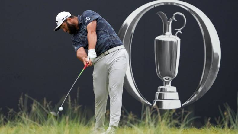 Jul 22, 2023; Hoylake, ENGLAND, GBR; Jon Rahm tees off on the first hole during the third round of The Open Championship golf tournament at Royal Liverpool. Mandatory Credit: Kyle Terada-USA TODAY Sports