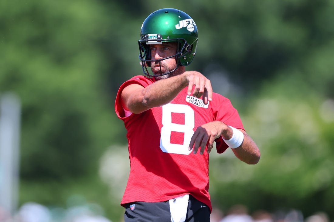 Jul 22, 2023; Florham Park, NJ, USA; New York Jets quarterback Aaron Rodgers (8) participates in drills during the New York Jets Training Camp at Atlantic Health Jets Training Center. Mandatory Credit: Vincent Carchietta-USA TODAY Sports