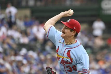 Jul 22, 2023; Chicago, Illinois, USA; St. Louis Cardinals starting pitcher Miles Mikolas (39) pitches against the Chicago Cubs during the first inning at Wrigley Field. Mandatory Credit: Matt Marton-USA TODAY Sports