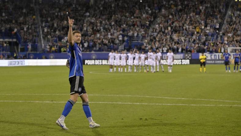 Jul 22, 2023; Montreal, Quebec, CAN; CF Montreal defender Gabriele Corbo (25) reacts after scoring on a penalty kick against CF Montreal during a shootout in a Leagues Cup game at Stade Saputo. Mandatory Credit: Eric Bolte-USA TODAY Sports