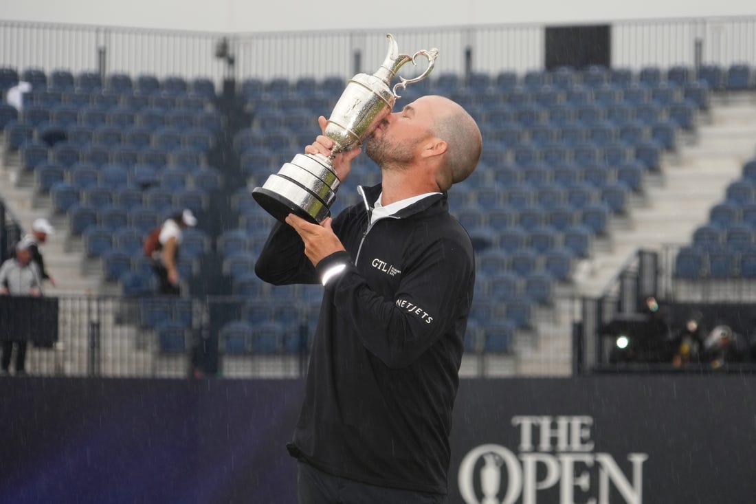 Jul 23, 2023; Hoylake, England, GBR; Brian Harman kisses the Claret Jug after winning The Open Championship golf tournament. Mandatory Credit: Kyle Terada-USA TODAY Sports