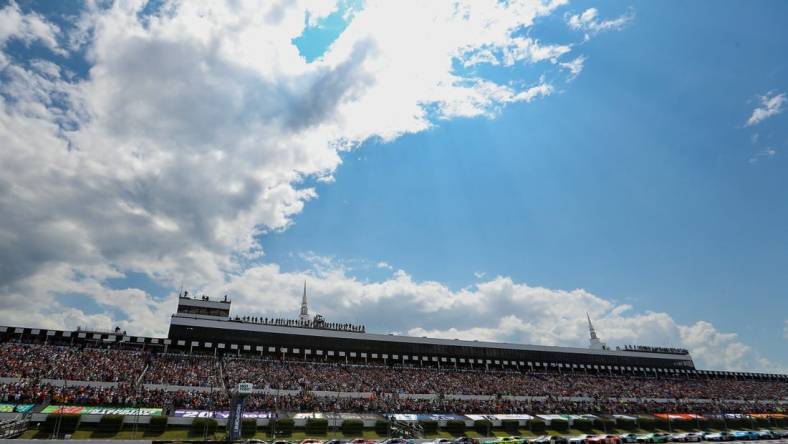 Jul 23, 2023; Long Pond, Pennsylvania, USA; NASCAR Cup Series driver William Byron (24) leads the field to the green flag to start the HighPoint.com 400 at Pocono Raceway. Mandatory Credit: Matthew O'Haren-USA TODAY Sports