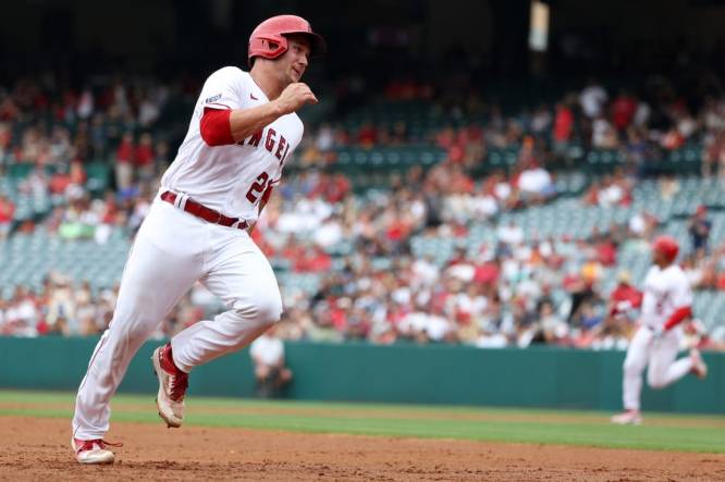 Angels hit four homers in win over Pirates