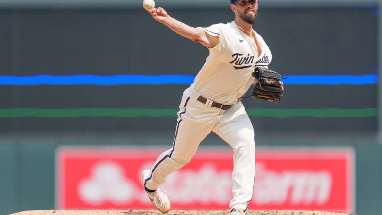 Jul 23, 2023; Minneapolis, Minnesota, USA; Minnesota Twins relief pitcher Jorge Lopez (48) pitches in the tenth inning against the Chicago White Sox at Target Field. Mandatory Credit: Matt Blewett-USA TODAY Sports