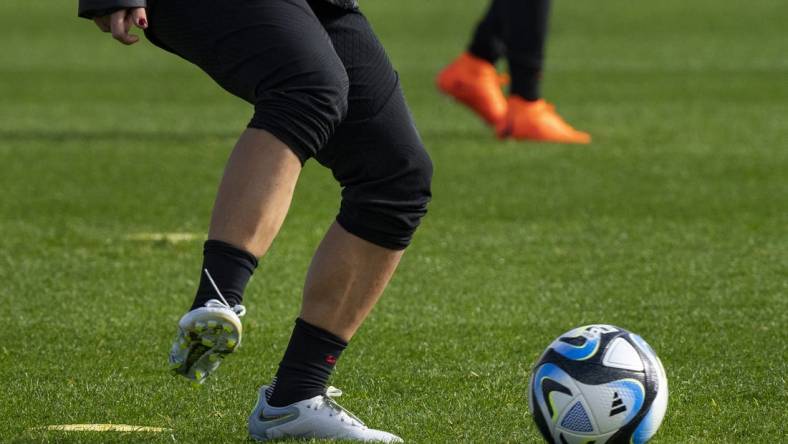 Jul 24, 2023; Auckland, NZL; A U.S. player kicks a ball during a training session at Bay City Park amid the 2023 FIFA Women's World Cup. Mandatory Credit: Jenna Watson-USA TODAY Sports