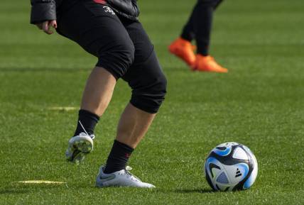 Jul 24, 2023; Auckland, NZL; A U.S. player kicks a ball during a training session at Bay City Park amid the 2023 FIFA Women's World Cup. Mandatory Credit: Jenna Watson-USA TODAY Sports