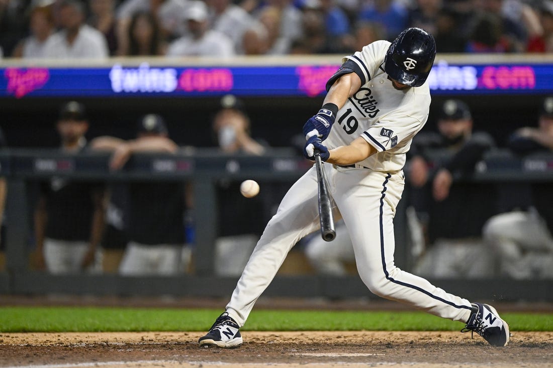 Jul 24, 2023; Minneapolis, Minnesota, USA;  Minnesota Twins infielder Alex Kirilloff (19) hits a double against the Seattle Mariners during the ninth inning at Target Field. Mandatory Credit: Nick Wosika-USA TODAY Sports