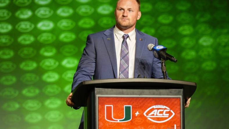 Jul 25, 2023; Charlotte, NC, USA;  Miami quarterback Tyler Van Dyke answers questions during ACC Media Days at The Westin Charlotte. Mandatory Credit: Jim Dedmon-USA TODAY Sports