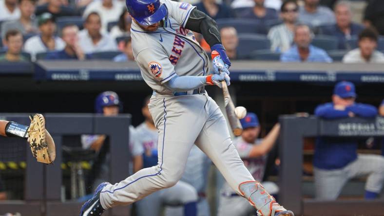 Jul 25, 2023; Bronx, New York, USA; New York Mets first baseman Pete Alonso (20) hits a three run home run during the third inning against the New York Yankees at Yankee Stadium. Mandatory Credit: Vincent Carchietta-USA TODAY Sports