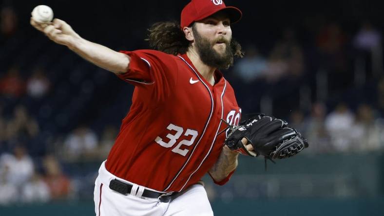 Jul 25, 2023; Washington, District of Columbia, USA; Washington Nationals starting pitcher Trevor Williams (32) pitches against the Colorado Rockies during the first inning at Nationals Park. Mandatory Credit: Geoff Burke-USA TODAY Sports