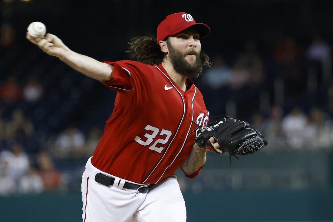 Jul 25, 2023; Washington, District of Columbia, USA; Washington Nationals starting pitcher Trevor Williams (32) pitches against the Colorado Rockies during the first inning at Nationals Park. Mandatory Credit: Geoff Burke-USA TODAY Sports