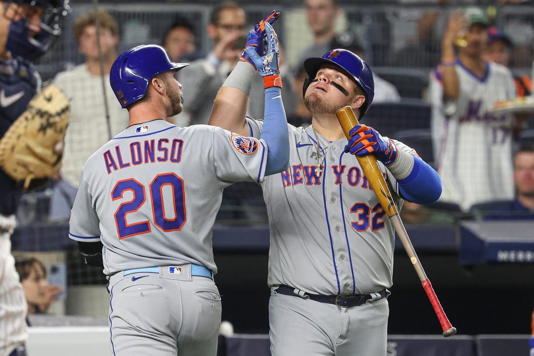 Jul 25, 2023; Bronx, New York, USA; New York Mets first baseman Pete Alonso (20) celebrates his solo home run with designated hitter Daniel Vogelbach (32) during the sixth inning against the New York Yankees at Yankee Stadium. Mandatory Credit: Vincent Carchietta-USA TODAY Sports