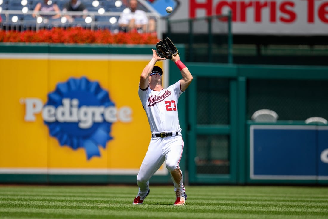 Nationals rally with 4-run ninth to edge Rockies