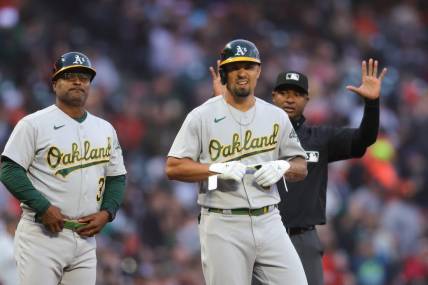 Jul 26, 2023; San Francisco, California, USA;  Oakland Athletics third baseman Jace Peterson (6) hits a two-RBI triple during the fourth inning against the San Francisco Giants at Oracle Park. Mandatory Credit: Sergio Estrada-USA TODAY Sports