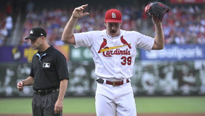 Jul 27, 2023; St. Louis, Missouri, USA; St. Louis Cardinals starting pitcher Miles Mikolas (39) reacts after being ejected in a game against the Chicago Cubs in the first inning at Busch Stadium. Mandatory Credit: Joe Puetz-USA TODAY Sports