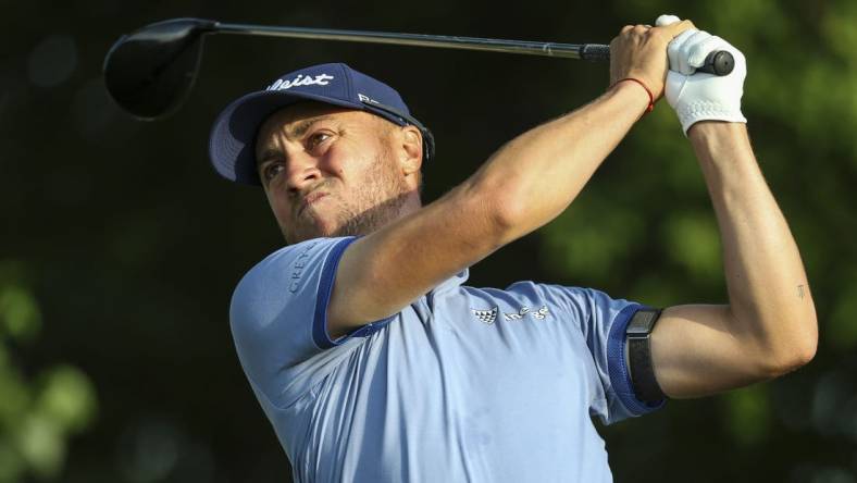 Jul 28, 2023; Blaine, Minnesota, USA; Justin Thomas hits his tee shot on the 11th hole during the second round of the 3M Open golf tournament. Mandatory Credit: Matt Krohn-USA TODAY Sports