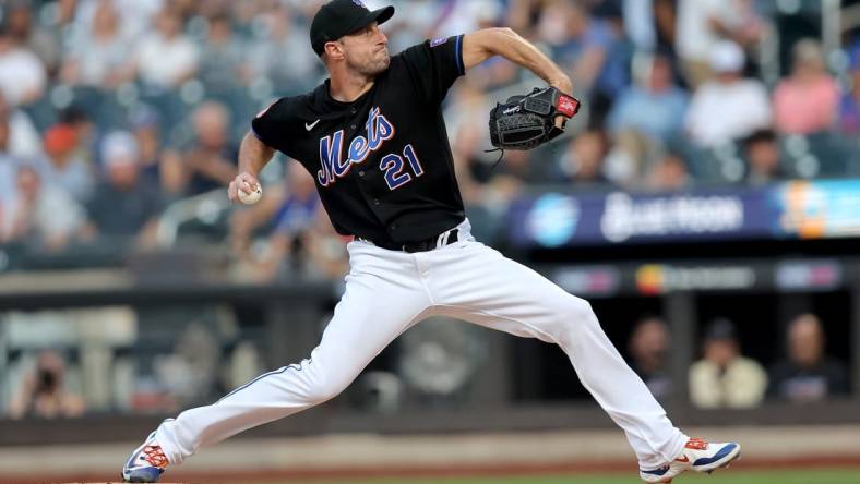 Jul 28, 2023; New York City, New York, USA; New York Mets starting pitcher Max Scherzer (21) pitches against the Washington Nationals during the first inning at Citi Field. Mandatory Credit: Brad Penner-USA TODAY Sports