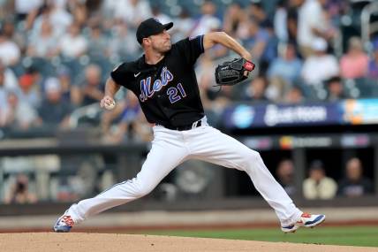 Jul 28, 2023; New York City, New York, USA; New York Mets starting pitcher Max Scherzer (21) pitches against the Washington Nationals during the first inning at Citi Field. Mandatory Credit: Brad Penner-USA TODAY Sports