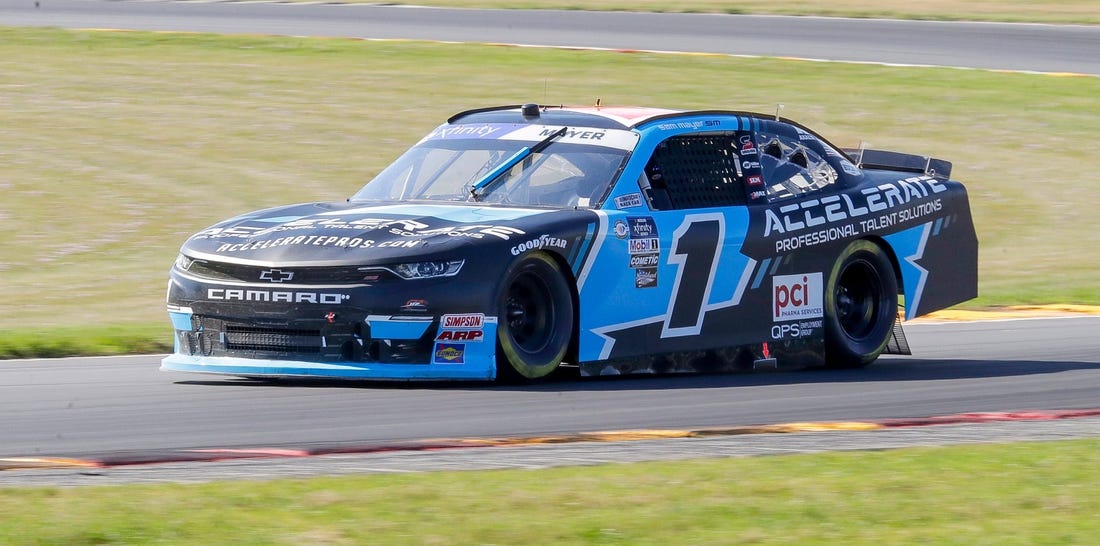 Sam Mayer (1) exits turn 3 during qualifying for the Road America 180, in the NASCAR Xfinity Series at Road America, Friday, July 28, 2023, near Plymouth, Wis.