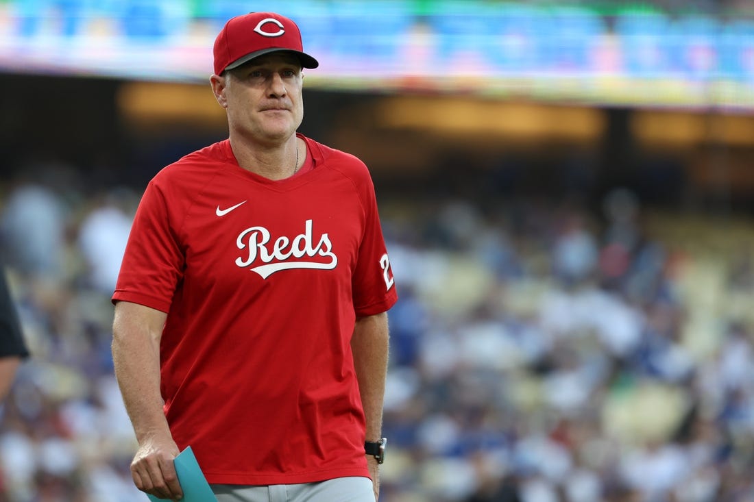Jul 28, 2023; Los Angeles, California, USA; Cincinnati Reds manager David Bell (25) walks back to the dugout before the game against the Los Angeles Dodgers at Dodger Stadium. Mandatory Credit: Kiyoshi Mio-USA TODAY Sports