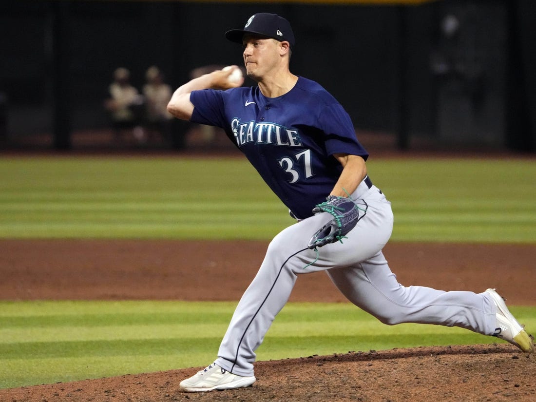 Jul 28, 2023; Phoenix, Arizona, USA; Seattle Mariners relief pitcher Paul Sewald (37) pitches against the Arizona Diamondbacks during the ninth inning at Chase Field. Mandatory Credit: Joe Camporeale-USA TODAY Sports