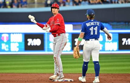 Jul 29, 2023; Toronto, Ontario, CAN; Los Angeles Angels designated hitter Shohei Ohtani (17) reacts after hitting a double against the Toronto Blue Jays in the third inning at Rogers Centre. Mandatory Credit: Dan Hamilton-USA TODAY Sports