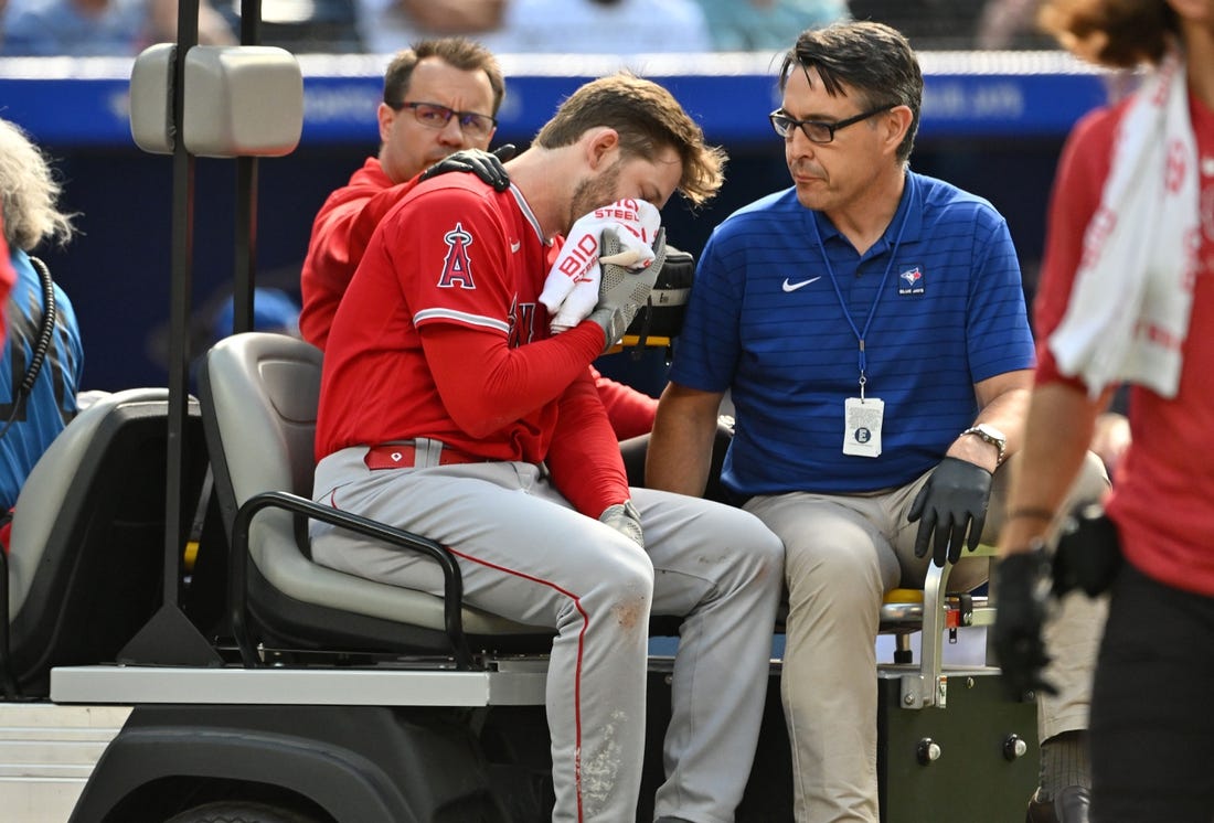 Jul 29, 2023; Toronto, Ontario, CAN;  Los Angeles Angels left fielder Taylor Ward (3) is taken off the field on a cart after being struck on the head by a pitch thrown by Toronto Blue Jays pitcher Alek Manoah in the fifth inning at Rogers Centre. Mandatory Credit: Dan Hamilton-USA TODAY Sports