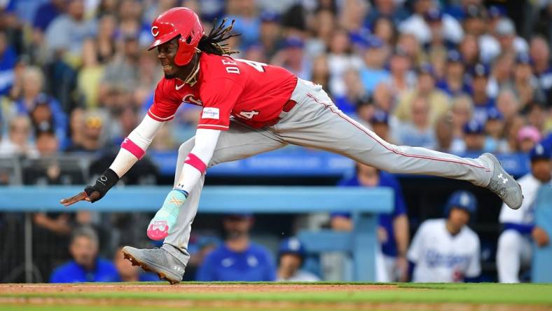 Jul 29, 2023; Los Angeles, California, USA;Cincinnati Reds shortstop Elly De La Cruz (44) runs home to score against the Los Angeles Dodgers during the sixth inning  at Dodger Stadium. Mandatory Credit: Gary A. Vasquez-USA TODAY Sports