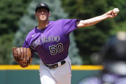 Jul 30, 2023; Denver, Colorado, USA; Colorado Rockies starting pitcher Ty Blach (50) pitches in the first inning against the Oakland Athletics at Coors Field. Mandatory Credit: Ron Chenoy-USA TODAY Sports
