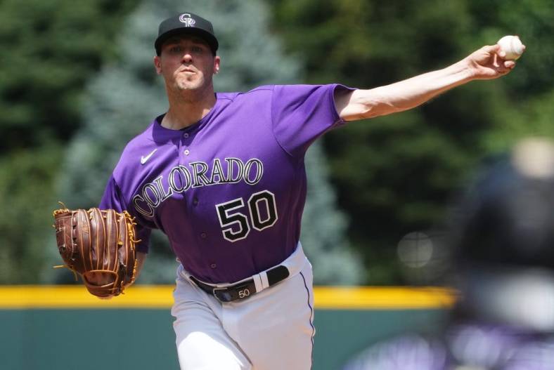 Jul 30, 2023; Denver, Colorado, USA; Colorado Rockies starting pitcher Ty Blach (50) pitches in the first inning against the Oakland Athletics at Coors Field. Mandatory Credit: Ron Chenoy-USA TODAY Sports