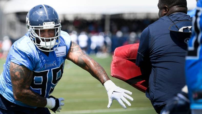 Tennessee Titans defensive end Jurrell Casey (99) pushes past defensive line coach Terrell Williams during practice at Saint Thomas Sports Park Saturday, Aug. 10, 2019 in Nashville, Tenn.

Nas Titans 8 10 Observations 006