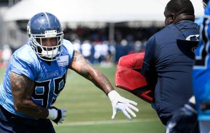 Tennessee Titans defensive end Jurrell Casey (99) pushes past defensive line coach Terrell Williams during practice at Saint Thomas Sports Park Saturday, Aug. 10, 2019 in Nashville, Tenn.

Nas Titans 8 10 Observations 006