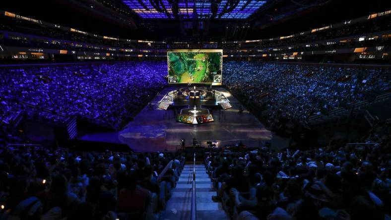 Aug 25, 2019; Detroit, MI, USA; Team Liquid (center left) competes against Cloud9 (center right) during the LCS Summer Finals event at Little Caesars Arena. Mandatory Credit: Raj Mehta-USA TODAY Sports