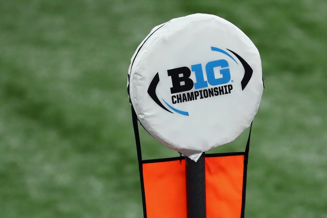 Dec 19, 2020; Indianapolis, Indiana, USA; A Big 10 Championship logo is seen atop a yardage marker during the first half between the Ohio State Buckeyes and the Northwestern Wildcats at Lucas Oil Stadium. Mandatory Credit: Aaron Doster-USA TODAY Sports