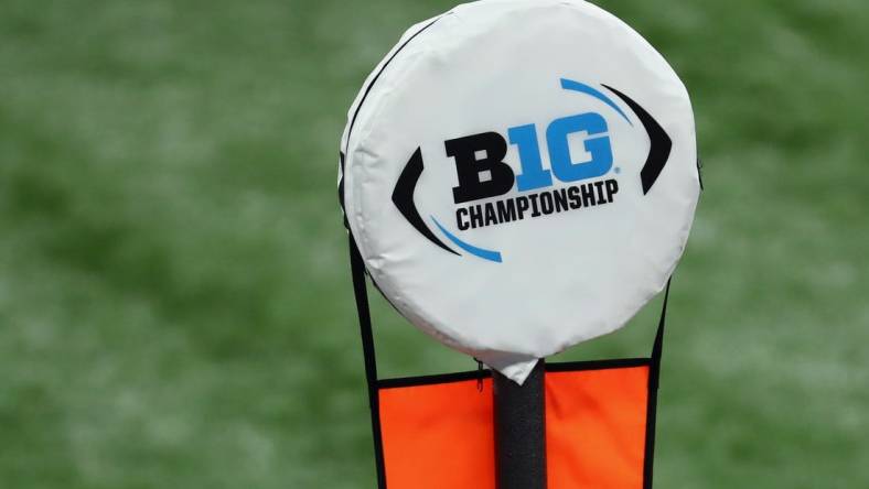 Dec 19, 2020; Indianapolis, Indiana, USA; A Big 10 Championship logo is seen atop a yardage marker during the first half between the Ohio State Buckeyes and the Northwestern Wildcats at Lucas Oil Stadium. Mandatory Credit: Aaron Doster-USA TODAY Sports