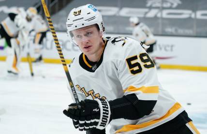 Apr 3, 2021; Boston, Massachusetts, USA; Pittsburgh Penguins left wing Jake Guentzel (59) warms up before the start of the game against the Boston Bruins at TD Garden. Mandatory Credit: David Butler II-USA TODAY Sports