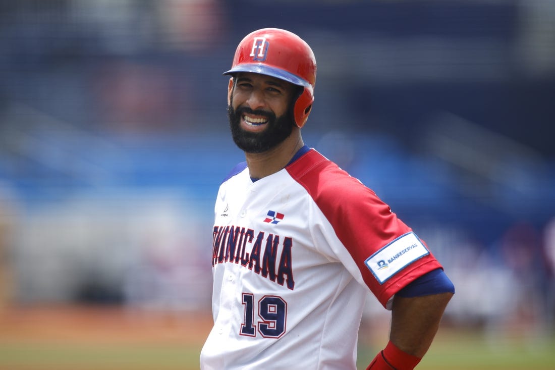 Jun 2, 2021; St. Lucie, Florida, USA; Dominican Republic first baseman Jose Bautista (19) reacts from first base against Nicaragua during the WBSC Baseball Americas Qualifier series at Clover Park. Mandatory Credit: Sam Navarro-USA TODAY Sports