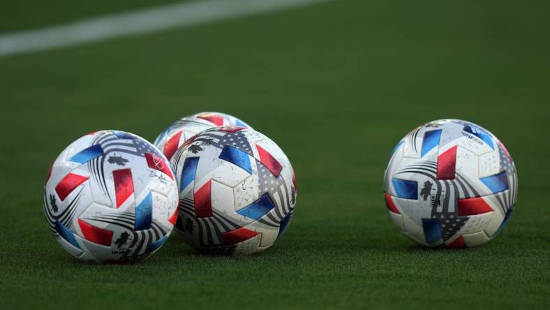 Jul 21, 2021; Fort Lauderdale, FL, USA; A general view of match balls on the pitch prior to the match between Inter Miami CF and the New England Revolution at DRV PNK Stadium. Mandatory Credit: Jasen Vinlove-USA TODAY Sports