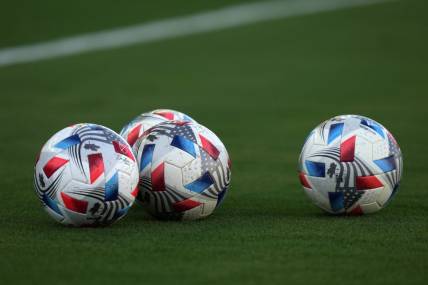 Jul 21, 2021; Fort Lauderdale, FL, USA; A general view of match balls on the pitch prior to the match between Inter Miami CF and the New England Revolution at DRV PNK Stadium. Mandatory Credit: Jasen Vinlove-USA TODAY Sports