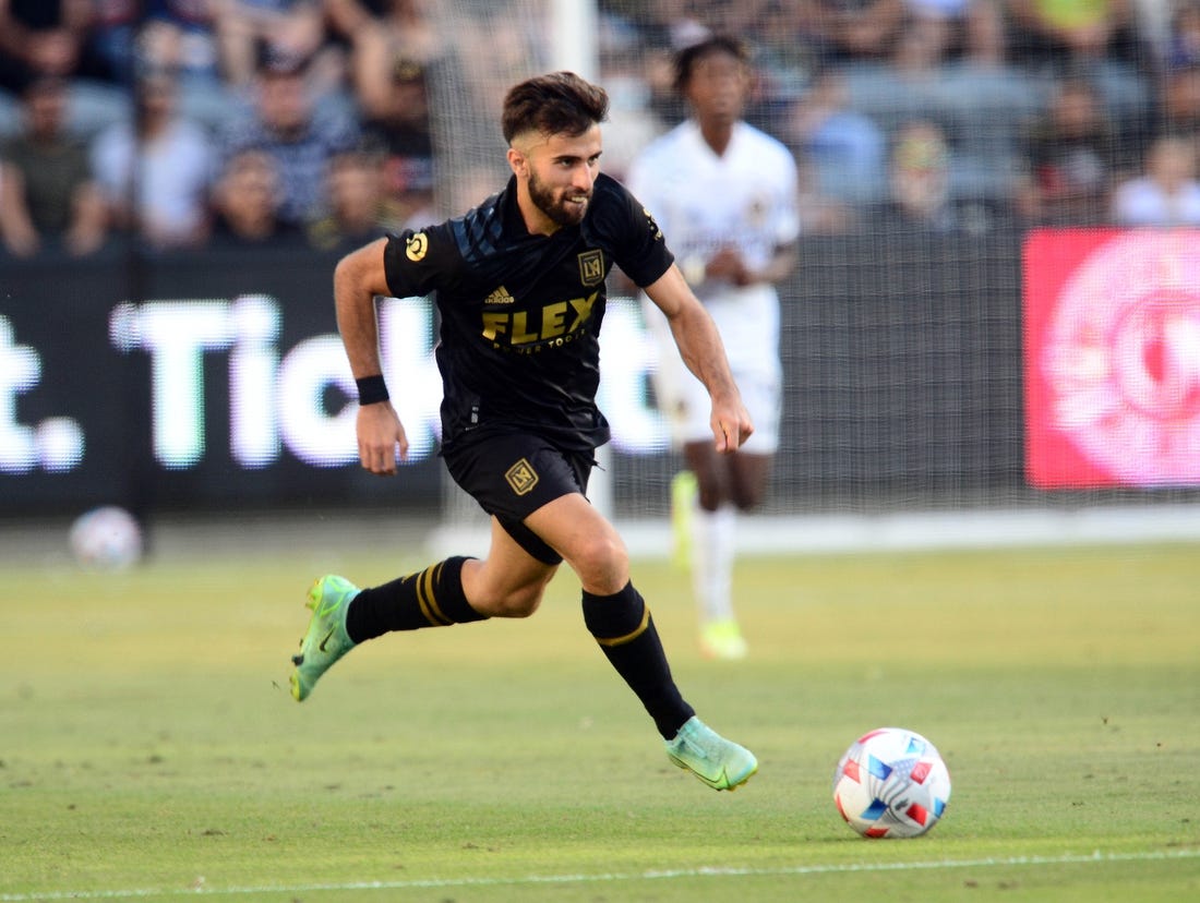 Aug 28, 2021; Los Angeles, CA, Los Angeles, CA, USA; Los Angeles FC forward Diego Rossi (9) moves the ball against the Los Angeles Galaxy during the second half at Banc of California Stadium. Mandatory Credit: Gary A. Vasquez-USA TODAY Sports