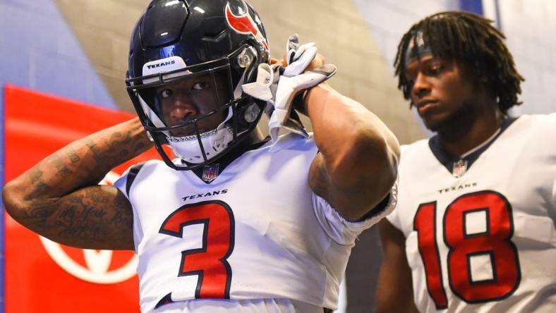 Oct 3, 2021; Orchard Park, New York, USA; Houston Texans wide receiver Anthony Miller (3) and wide receiver Chris Conley (18) walk to the field prior to the game against the Buffalo Bills at Highmark Stadium. Mandatory Credit: Rich Barnes-USA TODAY Sports