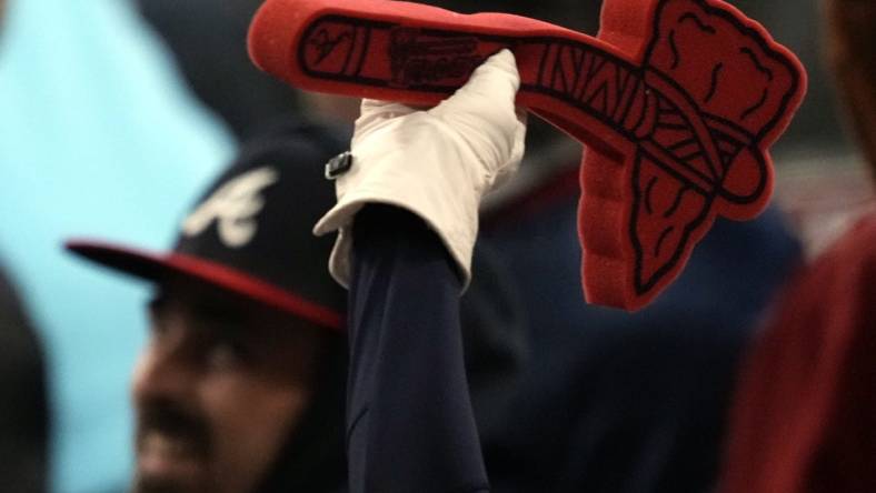 Oct 31, 2021; Atlanta, Georgia, USA; Atlanta Braves fans do the Tomahawk Chop during the eighth inning of game five of the 2021 World Series against the Houston Astros at Truist Park. Mandatory Credit: Dale Zanine-USA TODAY Sports