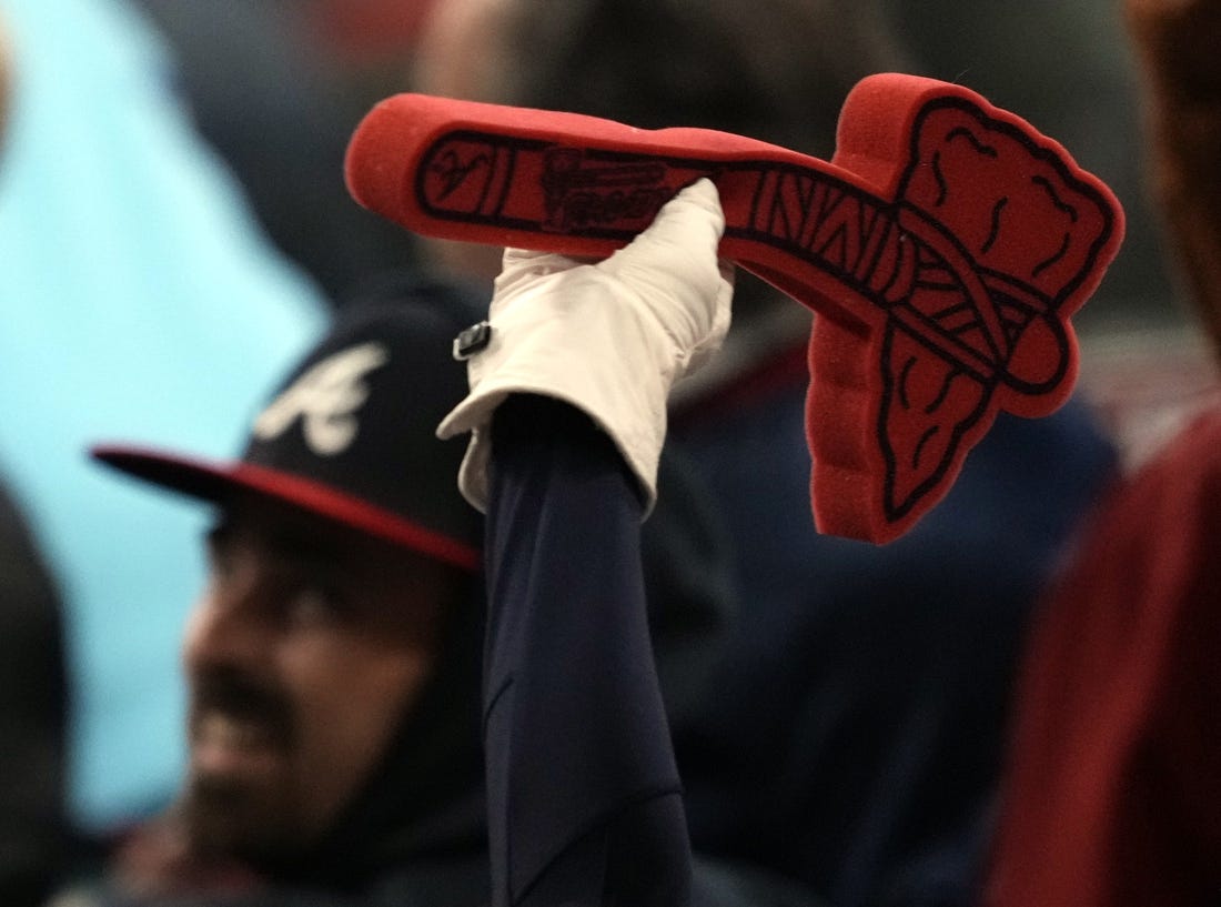 Oct 31, 2021; Atlanta, Georgia, USA; Atlanta Braves fans do the Tomahawk Chop during the eighth inning of game five of the 2021 World Series against the Houston Astros at Truist Park. Mandatory Credit: Dale Zanine-USA TODAY Sports