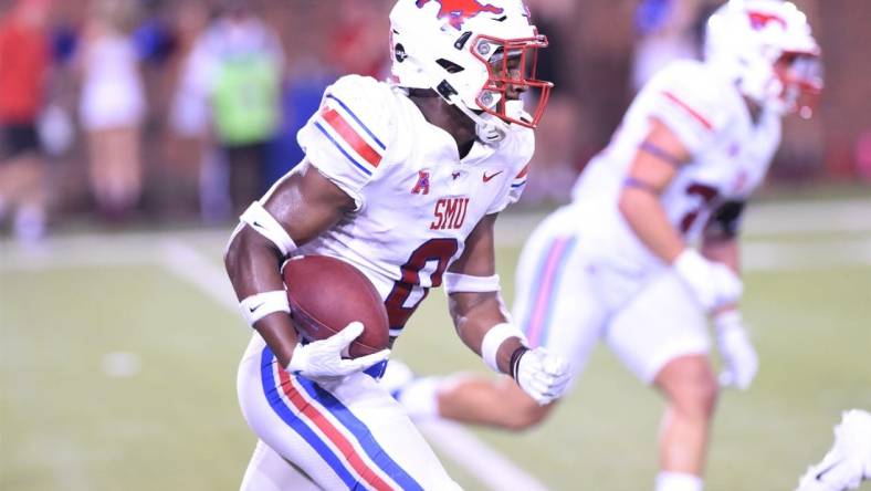 SMU's Bryan Massey (0) returns an interception on the final play of Saturday's game against ACU at Gerald J. Ford Stadium in Dallas on Sept. 4, 2021. The Mustangs won 56-9.

Hof 8420 2